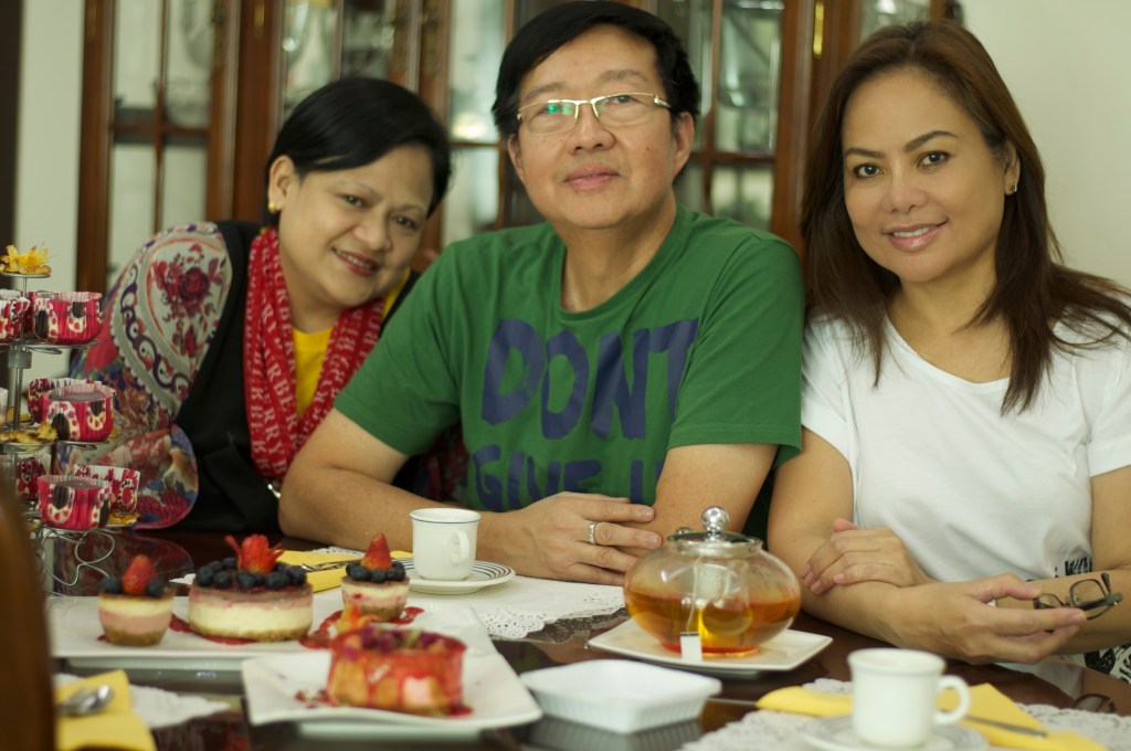 my friends and i enjoying an afternoon tea with my cheesecakes .