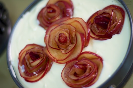 add apple rose on top of the cheese batter