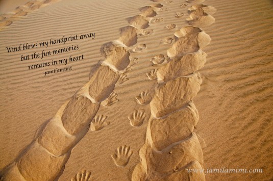 handprint in the sand